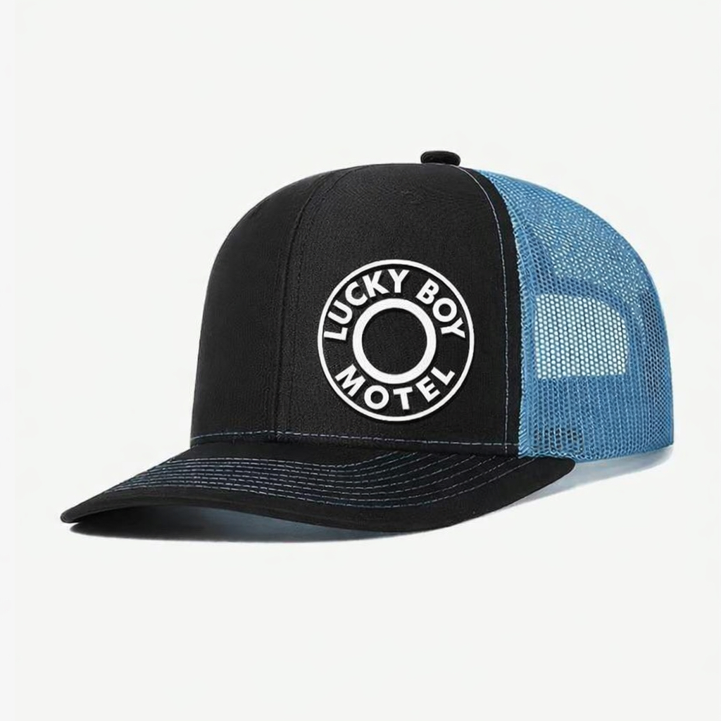 Lucky Boy Motel trucker cap with blue mesh back.